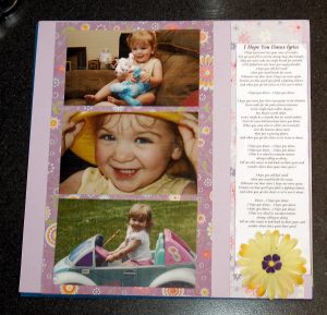 Simple layout with flower embellishment , border and inking